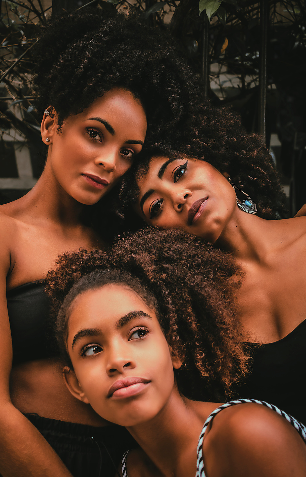 African American ladies and girl in street